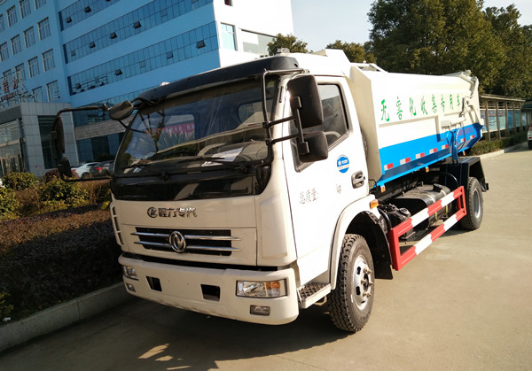 東風多利卡8方側(cè)裝壓縮式垃圾車