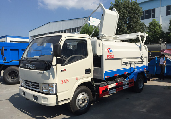 東風多利卡6方側(cè)裝壓縮式垃圾車